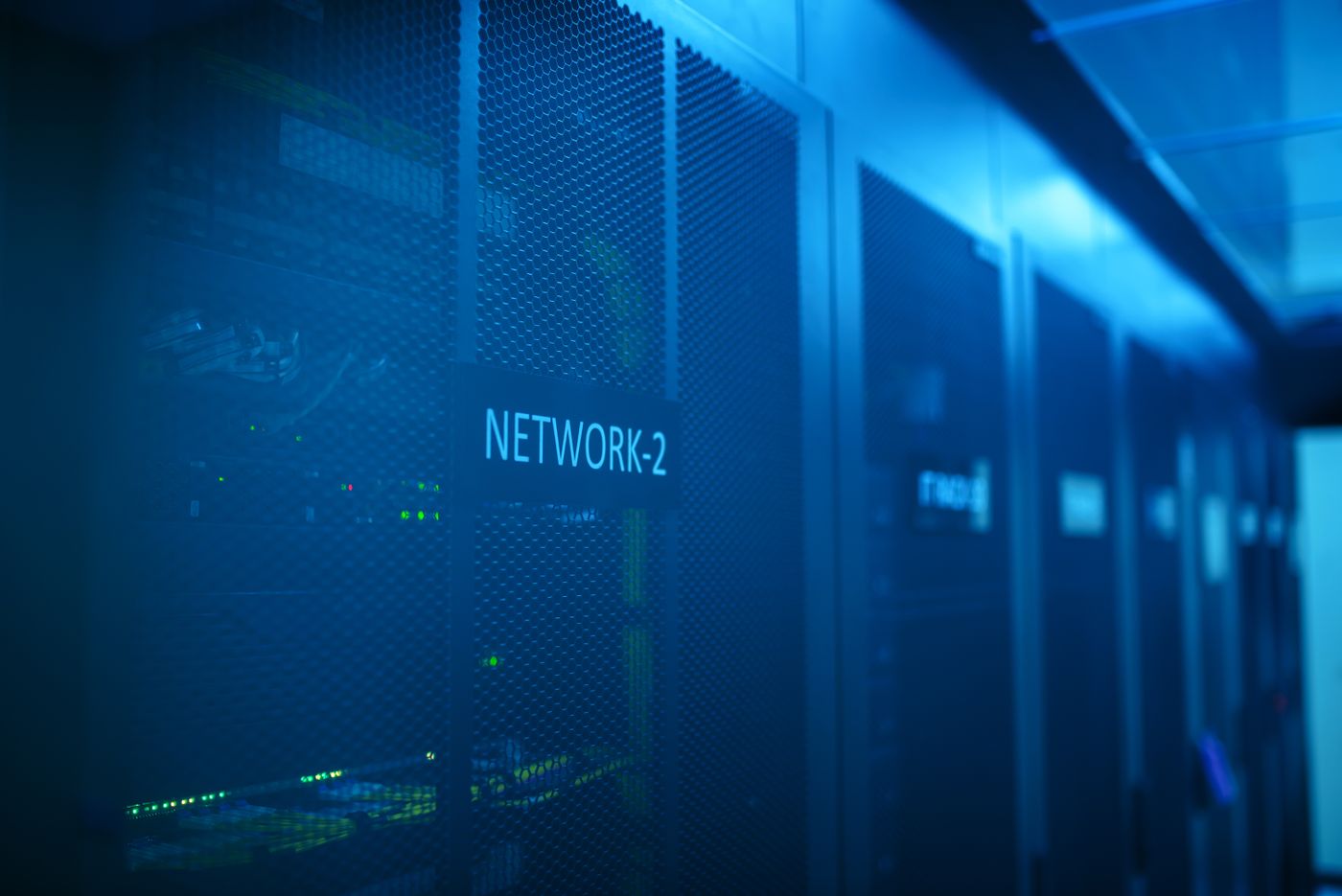 Blue-lit network racks in a data center